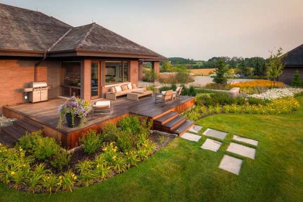 From the Ground Up: How Landscaping and Roofing Create a Safer, More Beautiful Home