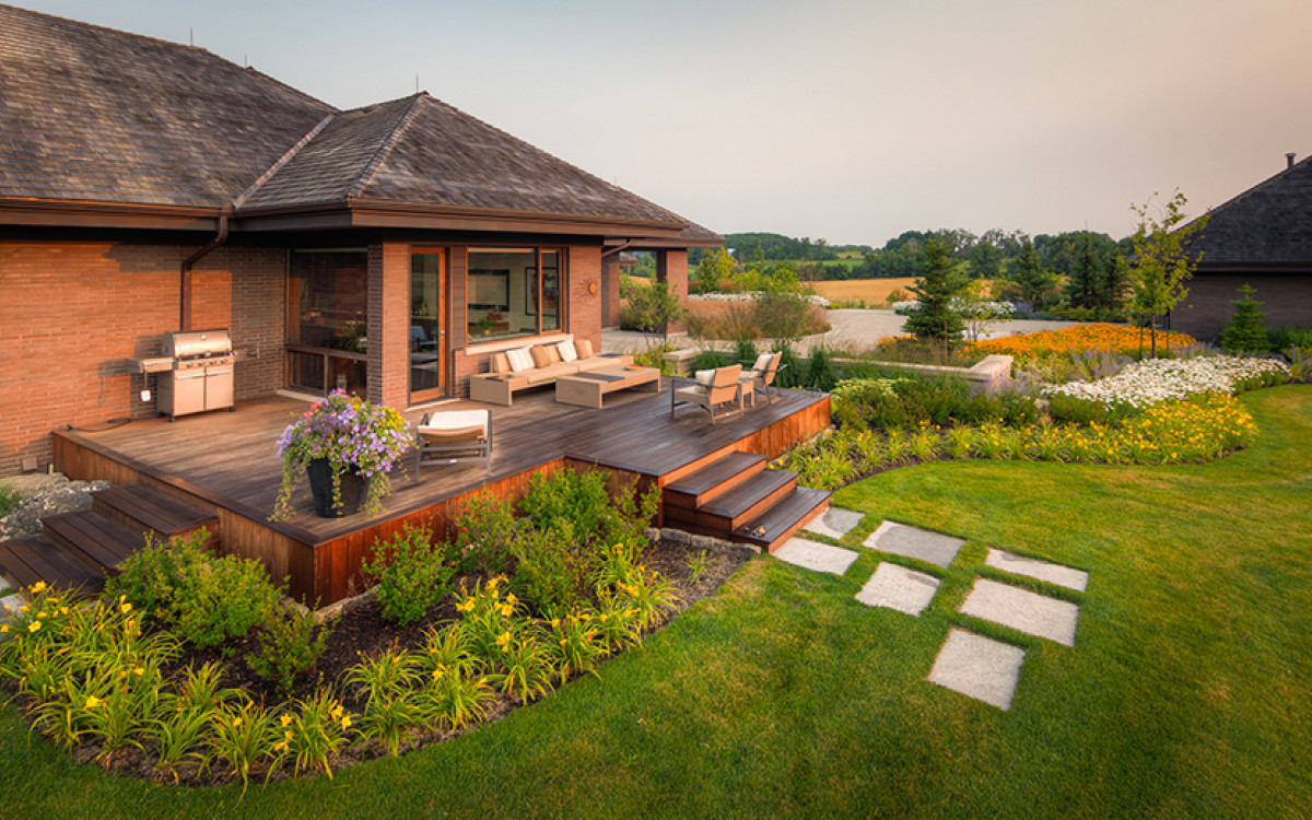 From the Ground Up: How Landscaping and Roofing Create a Safer, More Beautiful Home
